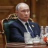 In this pool photograph distributed by the Russian state agency Sputnik, Russia's President Vladimir Putin attends the 18th BRICS Summit in New Delhi on September 12, 2026.