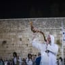 A Jewish man blows a shofar at the Western Wall in Jerusalem’s Old City during the final Selichot prayers ahead of Yom Kippur, September 19, 2026.