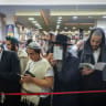 Jewish men at the tomb of Rabbi Nachman of Breslov in Uman, ahead of the Jewish holiday of Rosh Hashanah, September 22, 2025.