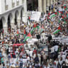 Demonstrators lift flags of Palestine and placards during a march calling for an end to war in the Gaza Strip and protesting the normalization of relations between Morocco and Israel, on Mohammed V avenue in Rabat on October 5, 2025; illustrative.