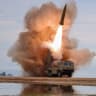 Illustrative: A rocket launcher fires a munition during tests, involving an upgraded version of a 240-mm, 24-tube multiple rocket launcher system, tactical ballistic missiles, and a 155-mm self-propelled howitzer, overseen by North Korean leader Kim Jong Un in North Korea, June 25, 2026.