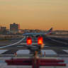An American Airlines airplane taxis on the tarmac at New York's Laguardia Airport.