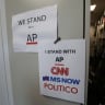 An updated solidarity sign adding CNN, MSNOW and POLITICO hangs outside the Associated Press booth at the White House grounds after US President Donald Trump banned three major news outlets – CNN, MS NOW and Politico from the White House, in Washington, D.C., US, September 21, 2026.