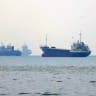 Vessels transit the Hormuz Strait off the coast of Iran's southern port city of Bandar Abbas on September 7, 2026.