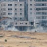 BULLDOZERS DEMOLISH a Palestinian building in Kafr Akab, near Jerusalem in the West Bank, in June 2026.
