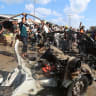 Palestinians inspect a vehicle hit by an Israeli airstrike in Khan Younis in the southern Gaza Strip, September 23, 2026