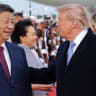 US President Donald Trump and Chinese President Xi Jinping speak as Xi arrives ahead of a state visit at Joint Base Andrews, Maryland, US, September 23, 2026. 