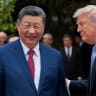 US President Donald Trump speaks with Chinese President Xi Jinping while leaving after a visit to the Zhongnanhai Garden in Beijing, China, May 15, 2026.