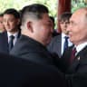 Russian President Vladimir Putin (R) greets North Korean Supreme Leader Kim Jong Un (L) after their bilateral meeting on September 3, 2025, in Beijing, China.