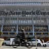 The New York Times logo is seen on the building's facade in New York City on January 22, 2026.