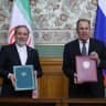 Russian Foreign Minister Sergei Lavrov and his Iranian counterpart Abbas Araghchi attend a signing ceremony following their talks in Moscow on December 17, 2025. (Illustartive)