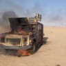 Iran-aligned Houthi fighters move next to a destroyed vehicle following what the source described as an attack on Saudi-backed forces in the location given by the source as al Jawf governorate, Yemen, in this screengrab taken from a video released by Houthi Military Media on September 15, 2026.