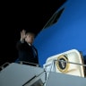 US President Donald Trump waves while boarding Air Force One at John F. Kennedy International Airport in New York on September 22, 2026.