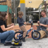 Shai Sheinfeld and Roy After with 5-year-old Ziv Cohen designing a bike for him for the Helen Hamlyn Center for Design’s 2026 Fixperts Awards.