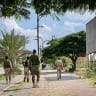 Members of the Tigray People's Liberation Front (TPLF) walk along a main road in Mekelle on September 23, 2026, as tensions intensify in northern Ethiopia after Tigrayan rebels seized control of airports in the region.