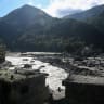 A general view shows damaged houses covered in sludge in the aftermath of the August 26 flash flood, at Betrawati Bazaar in Nepal's Rasuwa district on September 28, 2026.