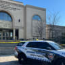 A Shomrim Toronto Jewish Safety Patrol vehicle is parked under police tape outside the Beth Avraham Yoseph of Toronto (BAYT) synagogue following gunshots fired at the building in Vaughan, Ontario, Canada, April 09, 2026.