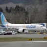 A Boeing 737 MAX aircraft bearing the logo of flydubai is parked at a Boeing production facility in Renton, Washington, US March 11, 2019.