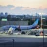 A flydubai plane carrying passengers from flight FZ1073 arrives at Ben Gurion International Airport near Tel Aviv, after a suspected terror attack aboard their original flight from Dubai to Israel forced an emergency landing in Saudi Arabia, September 30, 2026.