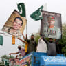 People carry posters showing the pictures of Chief of Army Staff of Pakistan Asim Munir, (R) along with Ahmed Sharif Chaudhry Director General of Inter-Service Public Relations wing of Pakistan Armed Forces, during a rally in support of Pakistan Army Thursday, 15th May 2025