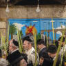 Praying at the entrance to the Temple Mount on Sukkot, Sept. 29.