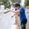 Hashomer Hachadash youth paint and beautify Kiryat Shmona during Sukkot