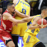 Maccabi Tel Aviv player Yam Madar against Hapoel Tel Aviv player Bar Timor.