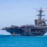 Nimitz-class aircraft carrier USS Theodore Roosevelt (CVN 71) departs Joint Base Pearl Harbor-Hickam, Hawaii, during Exercise Rim of the Pacific 2026, July 7, 2026. 