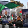 Demonstrators wave Palestinian flags and hold banners depicting Mohammad Hannoun, president of the Palestinian Association in Italy, who was arrested by Italian authorities over alleged funding of Hamas through charities, during a march in support of the Askatasuna social centre in Turin, Italy.