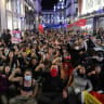 People take part in a protest against fascism and the housing crisis in Puerta del Sol square, where a camp has been set up, demanding political action to stop evictions and address the housing crisis, following the eviction of an 87-year-old woman from her home, in Madrid, Spain, October 3, 2026.