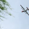  A US Coast Guard aircraft flies over the course during the first round of the LOTTE Championship presented by Hoakalei 2026 at Hoakalei Country Club on October 01, 2026 in Ewa Beach, Hawaii.