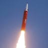 An intermediate-range missile is fired during a drill overseen by North Korean leader Kim Jong Un from the eastern region of the country toward the East Sea in North Korea, October 3, 2026, in this picture released by North Korea's official Korean Central News Agency.