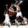 HAPOEL TEL AVIV’S Vasilije Micic passes under the hoop during the Reds’ 102-98 Euroleague win over Real Madrid.