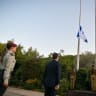 IDF soldiers lower Israeli flags to half-mast at the President's Residence in Jerusalem to commemorate the October 7 massacre, October 5, 2026.