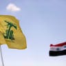 Hezbollah and Syrian flags are seen fluttering in Fleita, Syria.