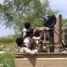 Saudi-backed Yemeni government forces ride in the back of a military truck at the Jabal Han front west of the city of Taiz following fierce battles earlier in the day as Yemen's Houthis reportedly attempted to seize control of the main route between the inland city of Taiz and Aden.