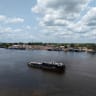 ILLUSTRATIVE: This aerial view shows a whaling boat sailing on the Congo River in Mbandaka, Equateur Province, Democratic Republic of Congo, on October 3, 2025. 