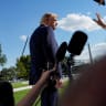 US President Donald Trump walks past the media before boarding Marine One as he travels to Grand Island, Nebraska, on the South Lawn of the White House in Washington, DC, US, October 5, 2026. 