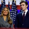 Former first lady Melania Trump and Barron Trump look on as Republican presidential nominee, former U.S. President Donald Trump speaks during an election night event at the Palm Beach Convention Center on November 06, 2024 in West Palm Beach, Florida.