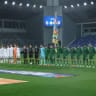 Israel's players (L) and the Republic of Ireland's players (R) stand alongside the officials for the national anthems ahead of the UEFA Nations League Group B3 football match between the Republic of Ireland and Israel at the TSC Arena in Backa Topola on October 4, 2026.