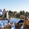 IFCJ PRESIDENT Yael Eckstein is seen speaking at the Flags of Fellowship commemoration at the Banyas Church. 