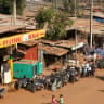 Motorcycles line up near a closed petrol station, amid ongoing fuel shortages caused by a blockade imposed by al Qaeda-linked insurgents in early September, in Bamako, Mali, October 31, 2025. 