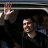 Released hostage Guy Gilboa-Dalal, who was kidnapped during the deadly October 7, 2023 attack by Hamas and taken to Gaza, gestures upon arrival at Rabin Medical Center-Beilinson Hospital, amid a hostages-prisoners swap and a ceasefire deal between Israel and Hamas in Gaza, in Petah Tikva, Israel Oct