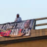 A large banner, reading "Ben-Gvir will not allow October 7 to happen again," is hung from a bridge in Israel as part of an effort by Ben-Gvir's Otzma Yehudit to campaign for upcoming elections as the nation marks three years since the October 7 Massacre on October 7, 2026.