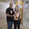 Matan Lior's parents, Ofer and Sarah, at the entrance to a courtroom at the Beersheba District Court, October 7, 2026