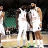HAPOEL JERUSALEM players celebrate after defeating Olimpija Ljubljana 75-64 to open their EuroCup campaign with a 2-0 record.