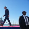 US Defense Secretary Pete Hegseth arrives onstage during an event at Sparrows Point Shipyard, in Baltimore County, Maryland, US, October 6, 2026. 
