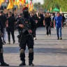 Iraqi security forces stand guard during a rally celebrating the withdrawal of forces of the US-led coalition against the Islamic State from Iraq in Baghdad on September 30, 2026.