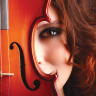 ILLUSTRATIVE: A woman's face is pictured behind a violin. 