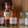 Collection of glass vials with medicines (illustrative)